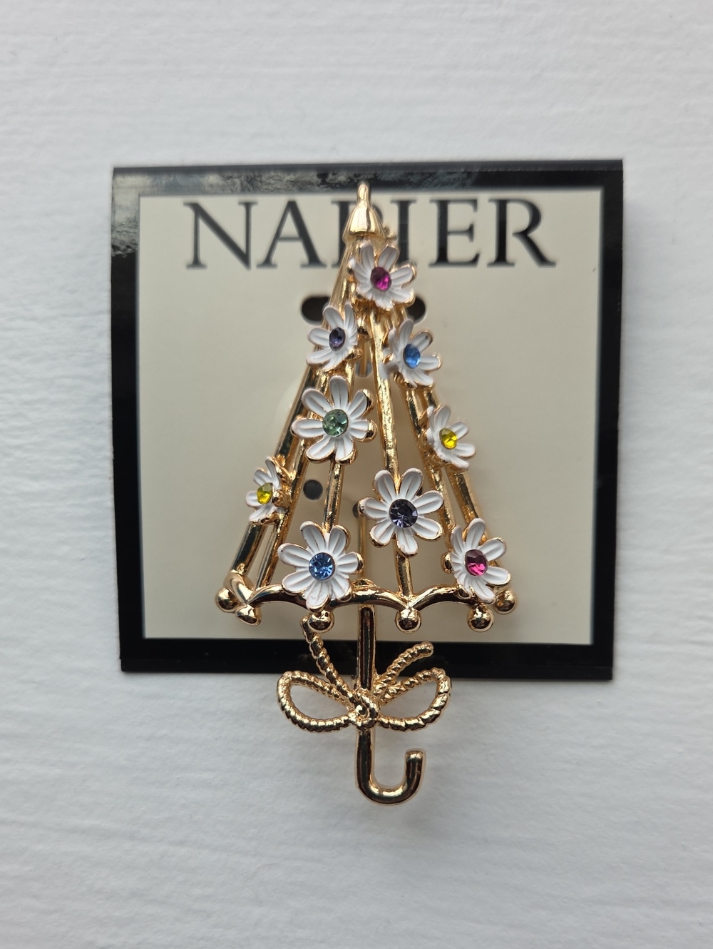 Napier Gold-Tone Flower Umbrella Brooch With White Enamel Flowers